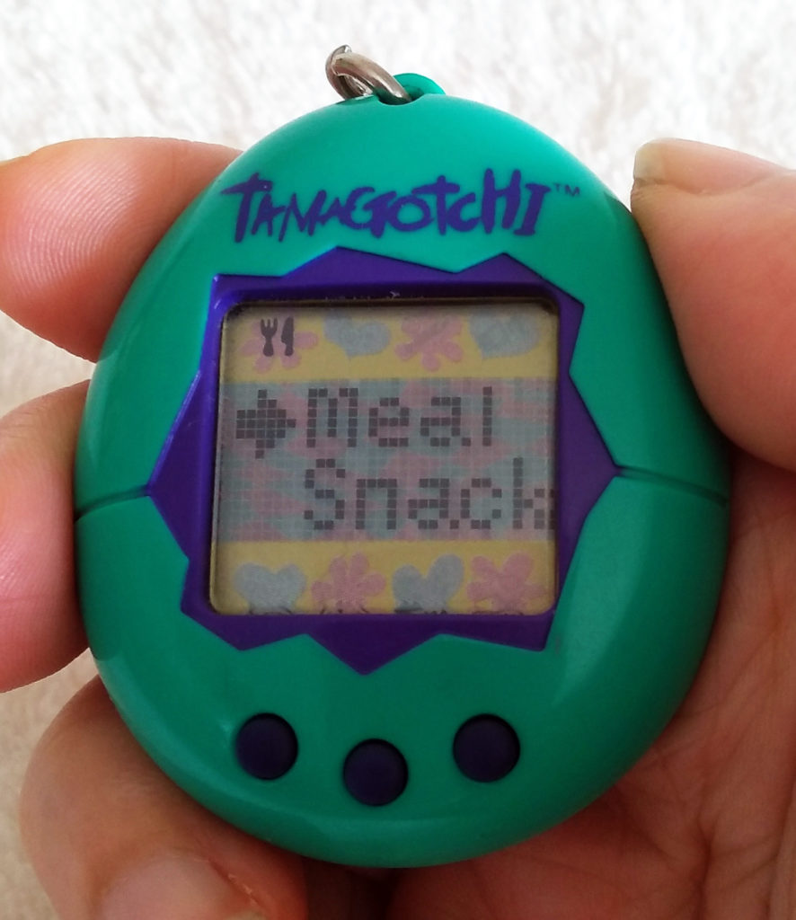 Tamagotchi P1 1997 Feeding